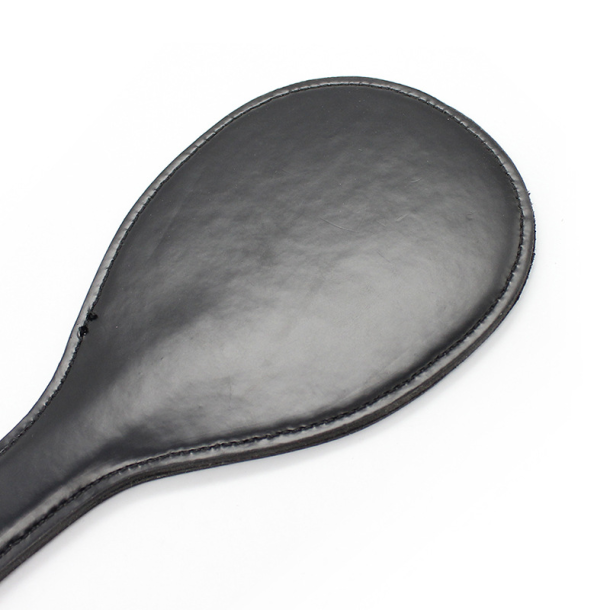 Bred paddle spanker med rem - sort