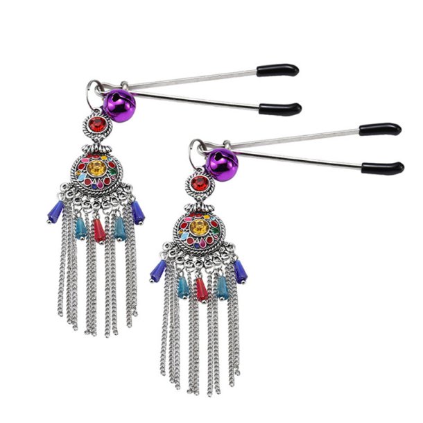 Brystsmykker 2 stk med lilla pynt